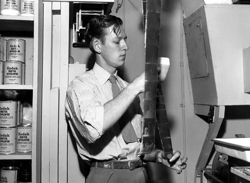 Ed Westcott in his darkroom at the Clinton Engineer Works, Oak Ridge, 1945. U.S. Army Corps of Engineers / Department of Energy photograph
